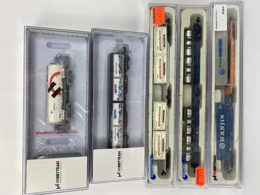 HOBBY-TRAIN – N – Lot de 5 wagons transports de frets dont 4 wagons double articulés et  un tanker dans 5 coffrets. Réf H23484,  H23451, H23750-12, H23715, H23714, NB